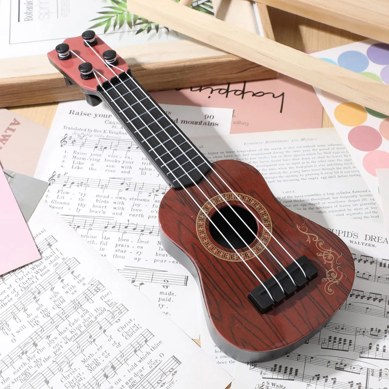 Musical Education property continuator and Playful Exploration Melodic Fun for Kids: Plastic Ukulele Guitar - A Musical Toy Instrument for Children, Inspiring 