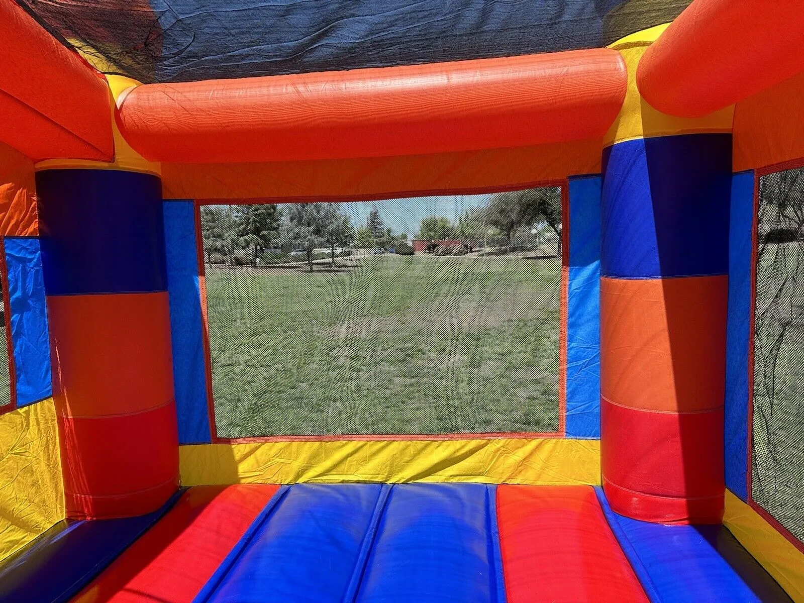 RAINBOW FIESTA BOUNCE HOUSE  100% PVC w/ 1HP COMMERCIAL BLOWER