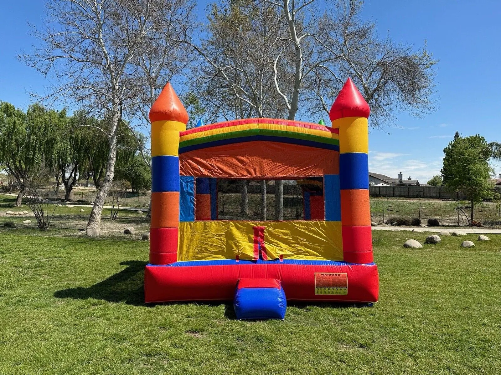 RAINBOW FIESTA BOUNCE HOUSE  100% PVC w/ 1HP COMMERCIAL BLOWER
